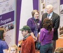 Guests peruse exhibits from 31 colleges, offices, and departments detailing the university's history.