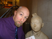 Joe Sutliff Sanders and a statue of Tintin