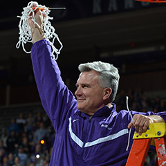 Coach Weber cuts down the net following last season's Big 12 Championship celebration