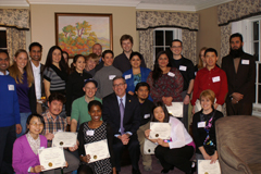 Postdocs and students with President Schulz