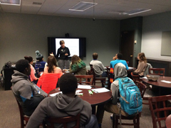 Laurie Curtis presents to a group of students from JCHS about how the brain learns.