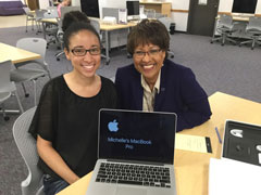 Michelle Bradshaw is presented with her laptop from Doris Wright Carroll 