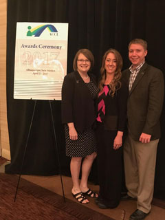 Melissa Wilmarth, Sarah Asebedo and Martin Seay receive the AARP Public Policy Institute's Financial Services and The Older Consumer Award.