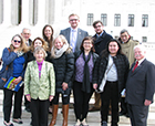 Monica Diaz, fifth from the left, and other 2018 National Newspaper Association Foundation news fellows, and their mentors pause for a photo on the steps of the U.S. Supreme Court Building during NNA’s Leadership Summit. 