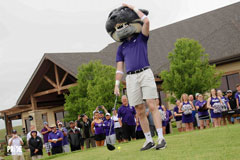 Frank Tracz, director of bands, is joined by several participants of the 8th Annual Marching Pride Scholars Golf Tournament as Willy strikes the inaugural shot. The event took place on Saturday, May 19 at Colbert Hills.