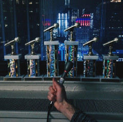 Awards from the Intercollegiate Broadcasting System Conference in front of the New York Skyline.  Students broadcasted live from the conference on KSDB's morning show.