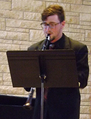 Steven Robinson plays a clarinet solo.