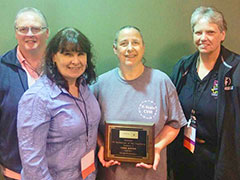 Lesa Reves receives technician of the year award