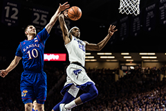 An example of Bergmeier's photography, this photo shows K-State Wildcat Xavier Sneed going for a dunk at the Sunflower Showdown.