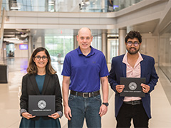 From left, Nandini Sarkar, Dean Darren Dawson,  and Joydeep Mitra