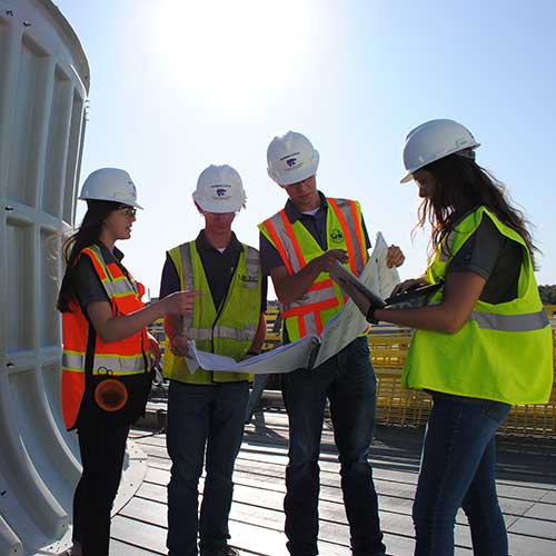 Construction science students atop the K-State cooling tower north of campus; from left: Annie Burnam, Trevor Waggoner, Collin Champagne and Kayla Huffman