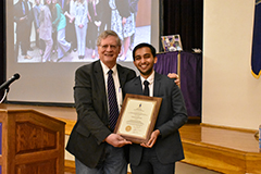 Vedant Kulkarni poses with his award.