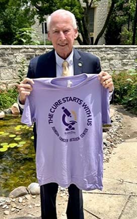 Coach Snyder with The Cure Starts With Us! t-shirt