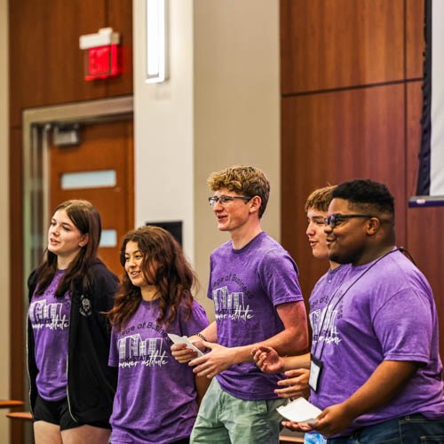 Students presenting at the high school summer business institute