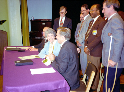 Governor Finney and Secretary Babbitt signing the State of Kansas Proclamation by the Governor