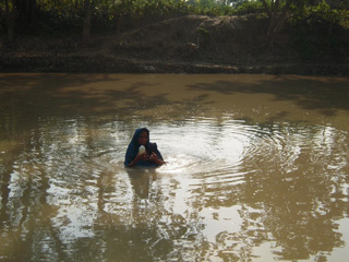 Woman in pond