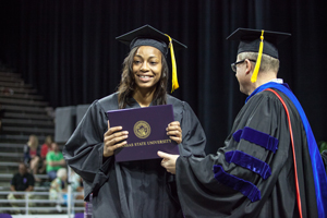A student-athlete receives her degree