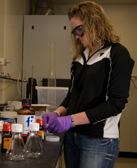 Audrey Polifka in the laboratory filtering materials