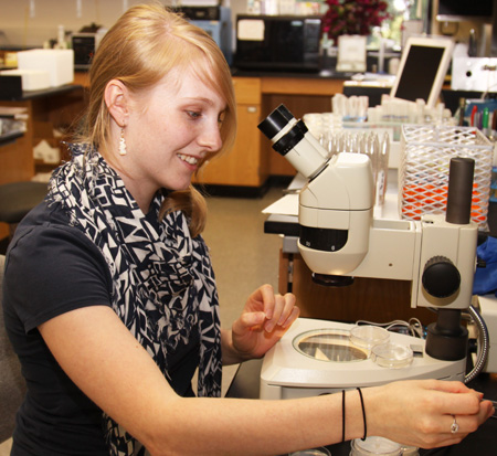 Katie Bowles at the microscope