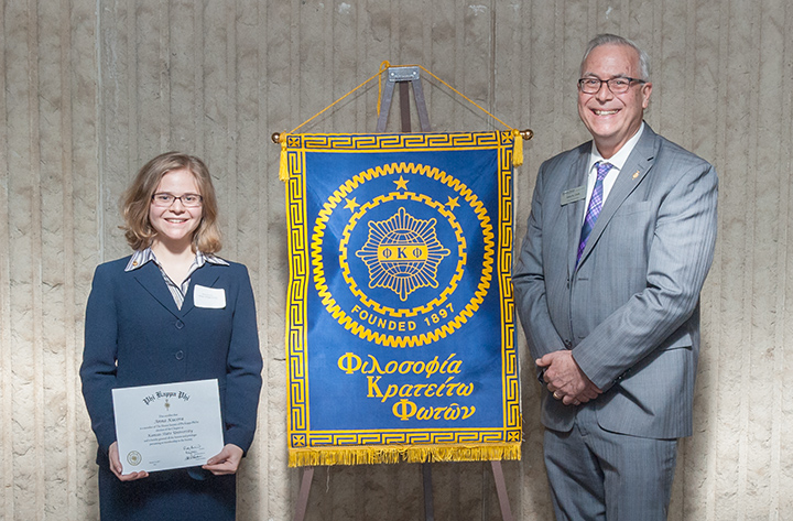 New initiate from College of Engineering Anna Kucera poses with Associate Dean Clark