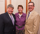 Schulz poses with Terry and Tara Cupps as part of the Celebration of Giving.
