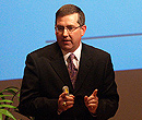 Kirk Schulz presenting before a K-State open forum.