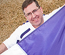 Kirk Schulz sporting a K-State flag.