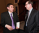 President Schulz chats with graduating senior Bobby Gomez.