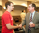 Chatting with a student.