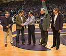 Recognition of Dr. Juergen Richt at K-State basketball game with Dr. Ron Trewyn, Dr. Ralph Richardson and Dr. April Mason.