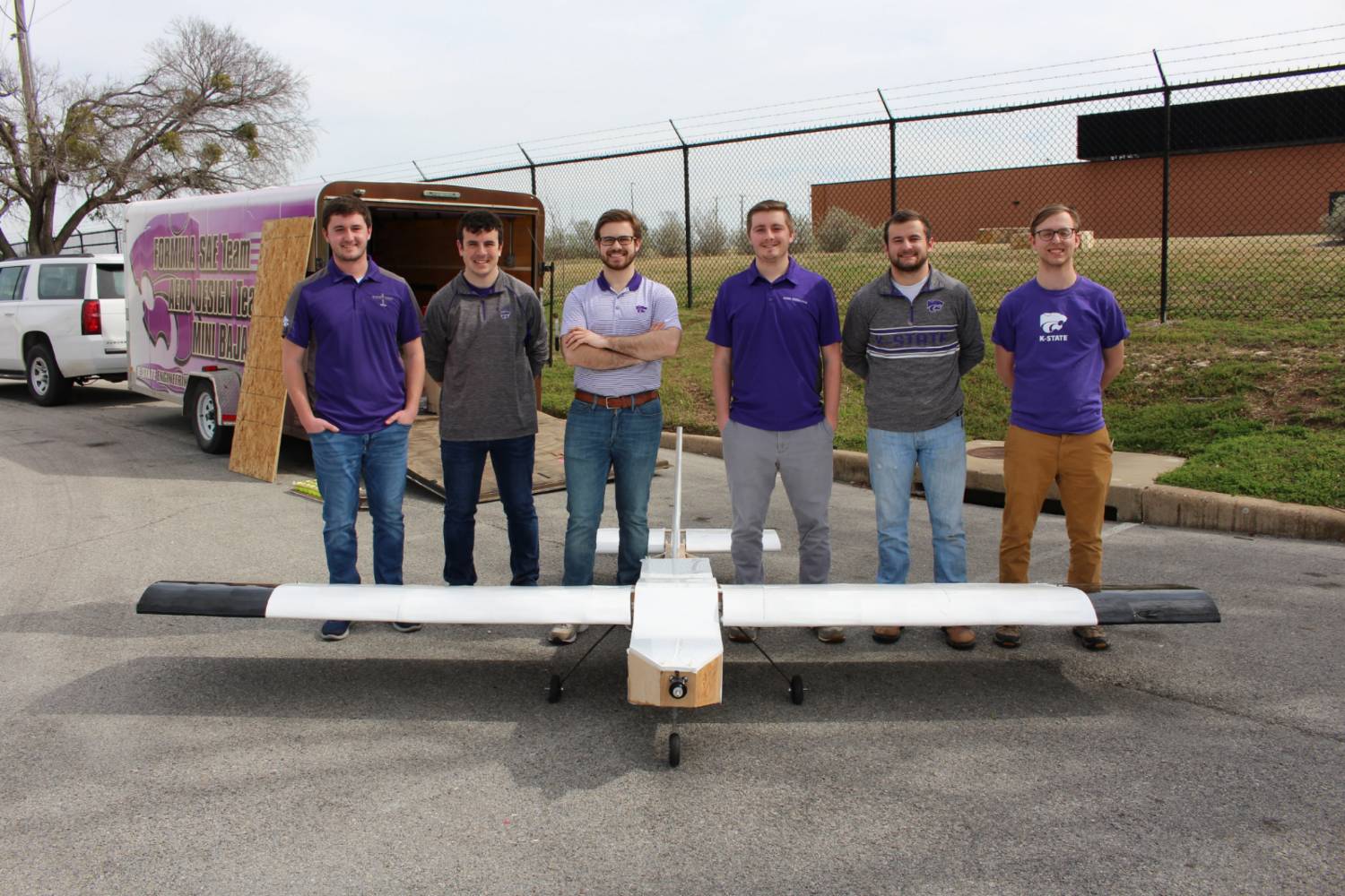 2019 East Competition Team members with the aircraft