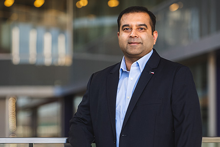 Arslan Munir, associate professor of computer science, is working with other researchers to design artificial intelligence that can get low-thrust, all-electric satellites into orbit in optimal time.