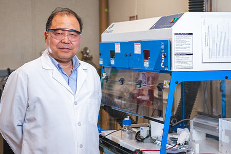 Jun Li, university distinguished professor of chemistry, is on a team of Kansas researchers testing electrospinning as a method of in-space 3D manufacturing.