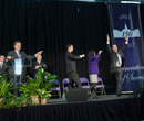 Nate Spriggs, 2012-2013 student body president, and former student body presidents Jackie McClaskey and Greg Musil do the 