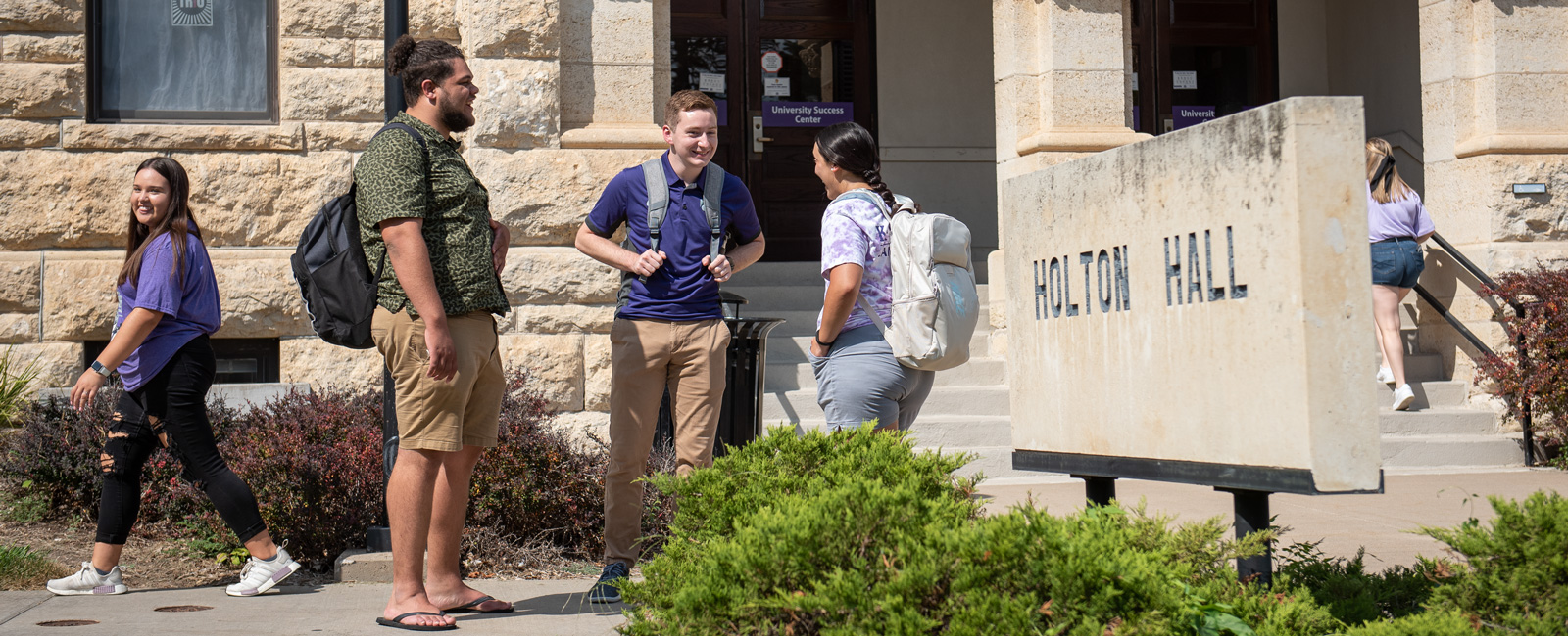 Front of Holton hall students talking