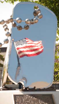 World War II Memorial - flag reflected in dog tags