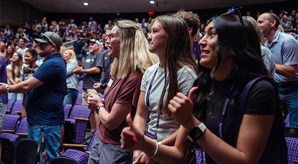 Hundreds of K-State students learn the Wabash Cannonball during new student orientation.