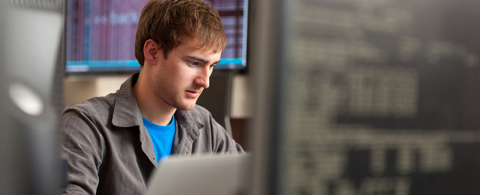 A student works at his computer.