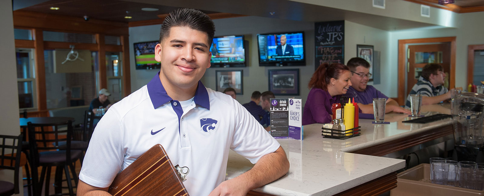 A host at a restaurant.