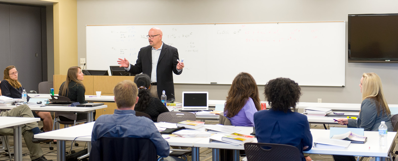 Professor and students in classroom 