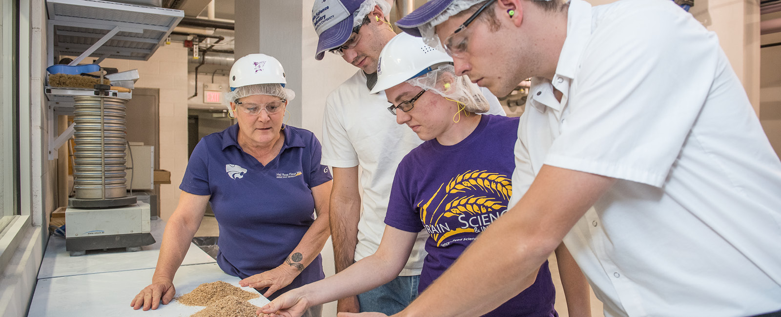 Students and professor in milling science lab