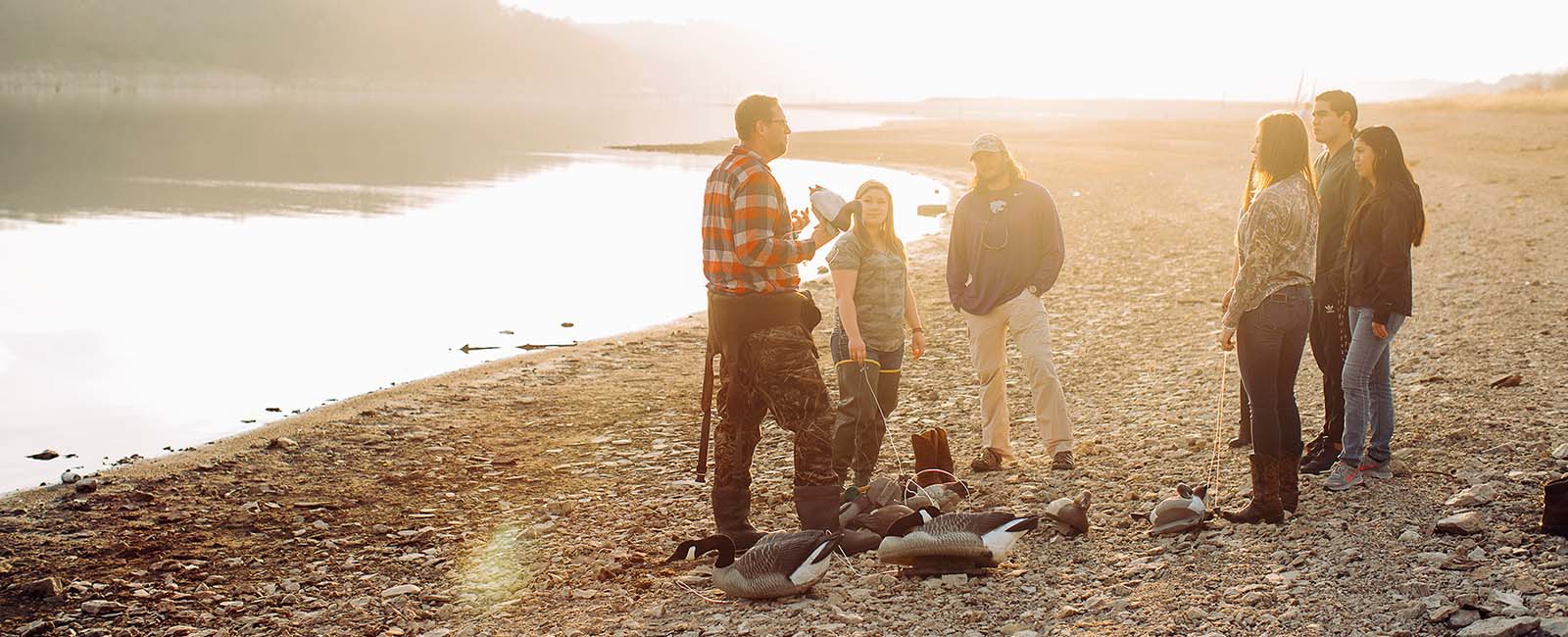 Student outside with decoys 