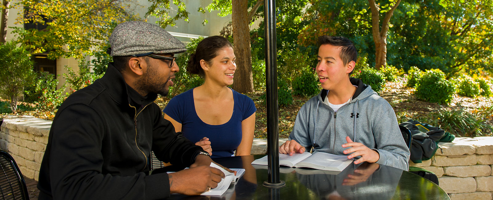 Students talking outside on campus