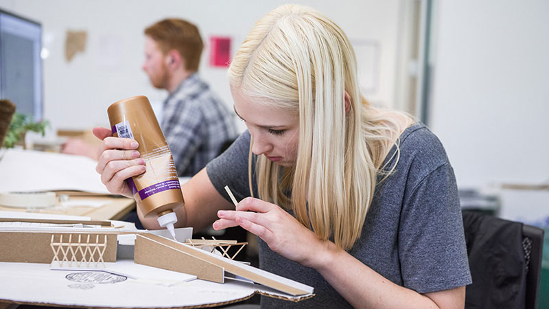 An architecture student working in studio