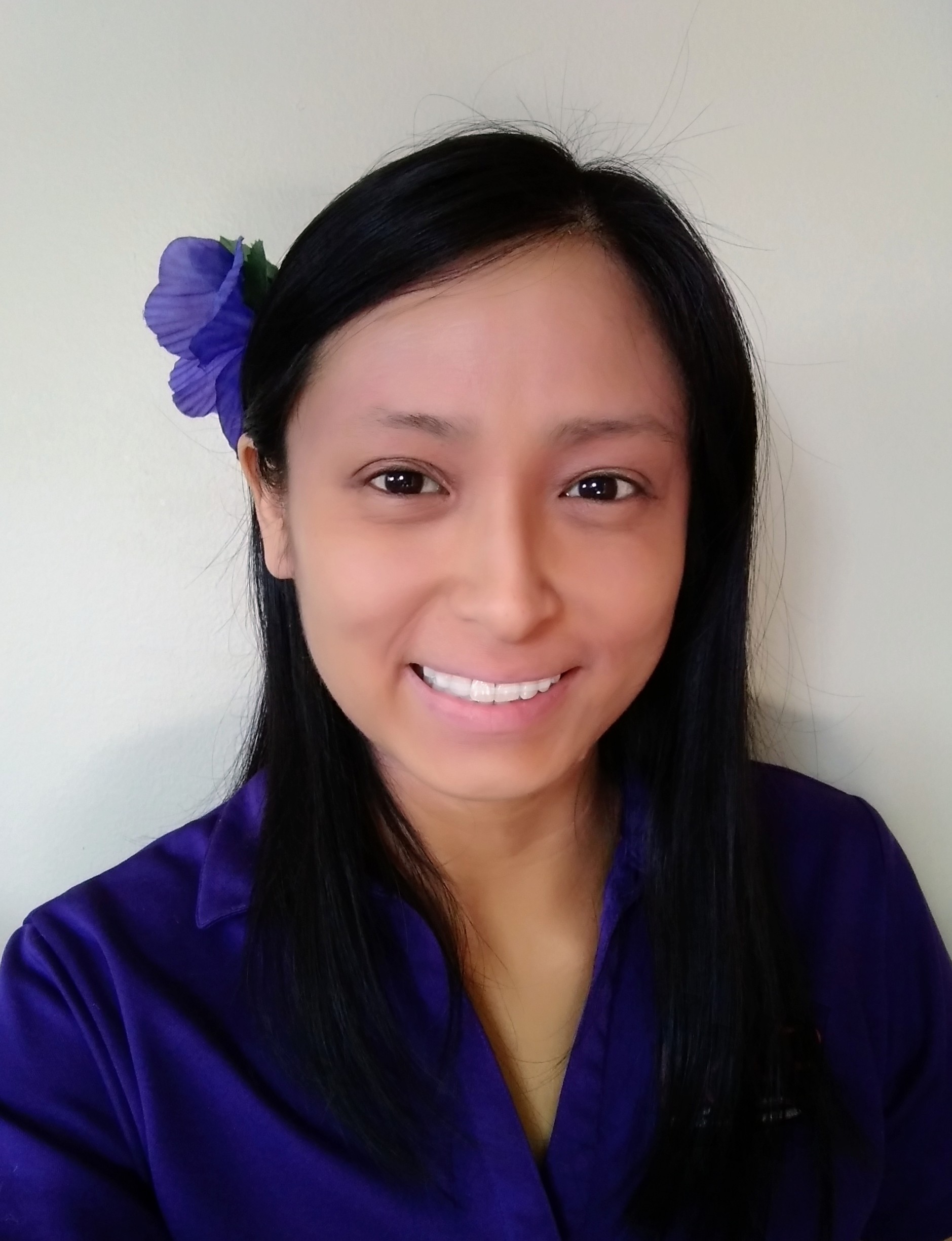Portrait photo of Angela, testing center program associate