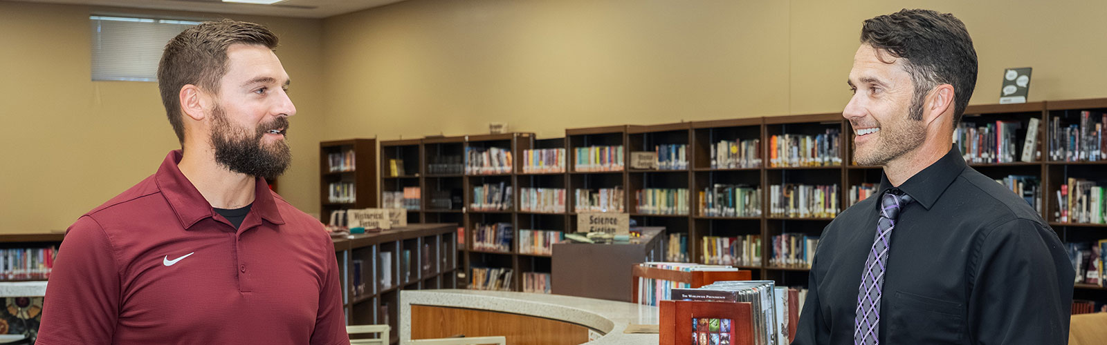 Dr. Erickson talks with an educational leadership student. 