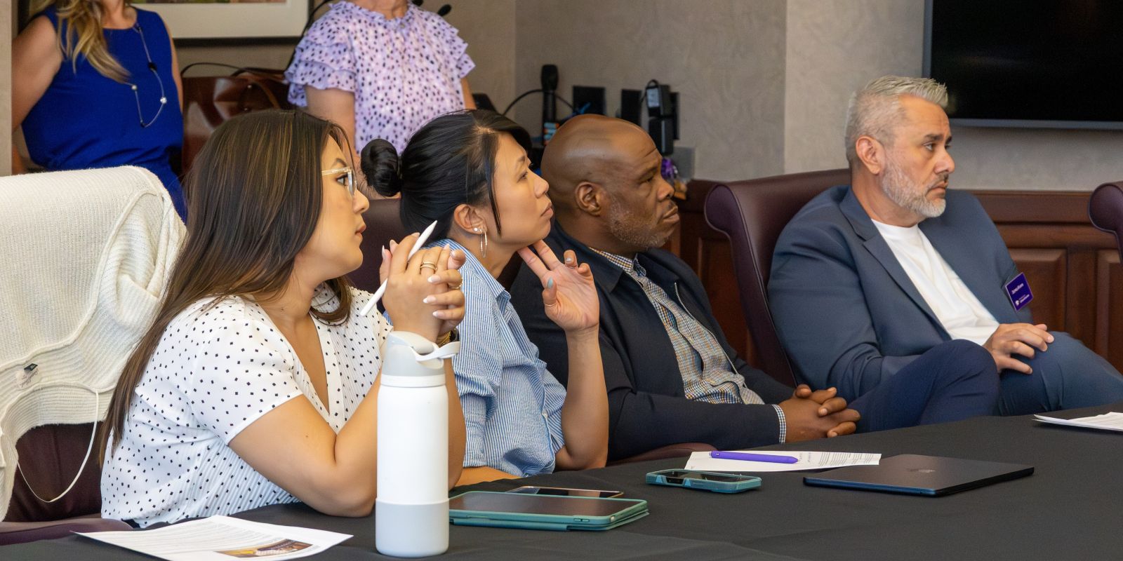 Dr. Erickson talks with an educational leadership student.