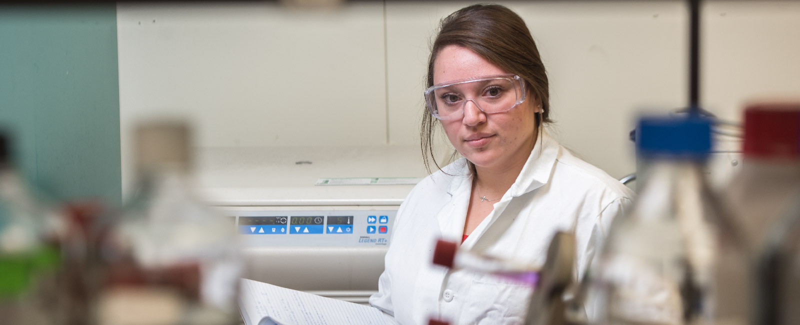 Graduate student working in a research laboratory