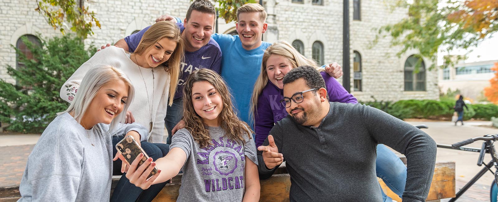 Group of students posing for a selfie together by Anderson Hall
