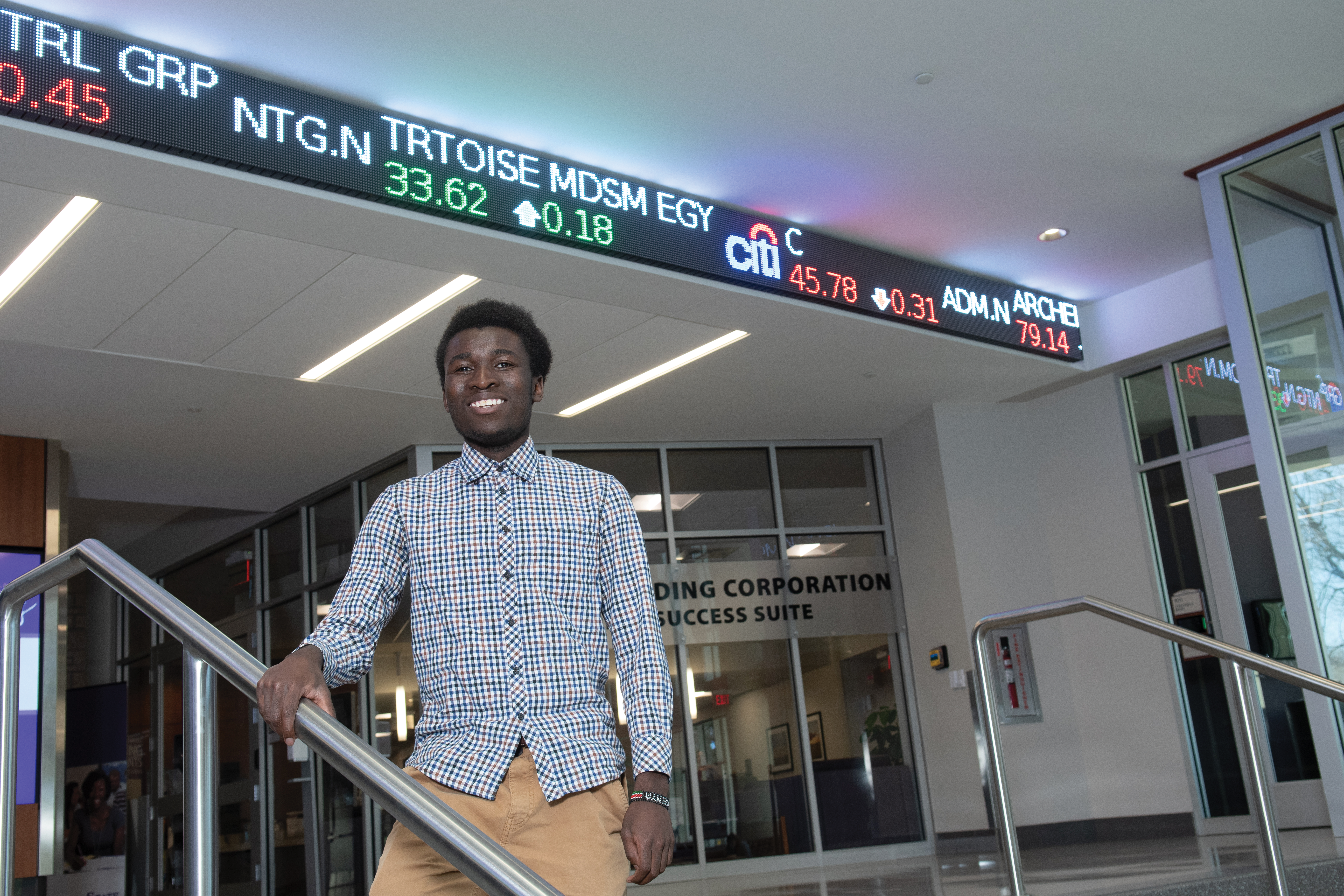 Brian Owuoche in the K-State Business Building